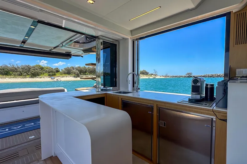 Da Mare Yacht Photos Pics Luxurious interior of 2023 OKEAN 52 yacht with ocean view and modern amenities.