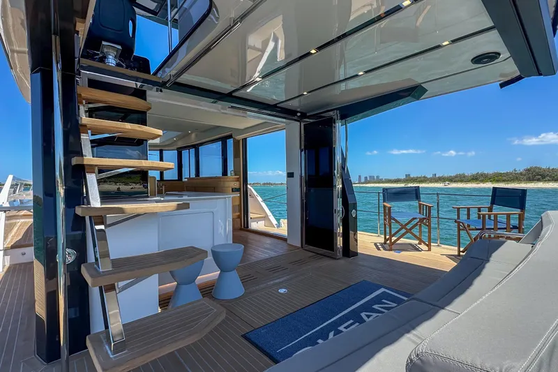 Da Mare Yacht Photos Pics Luxurious 2023 OKEAN 52 yacht interior with modern design and ocean view.