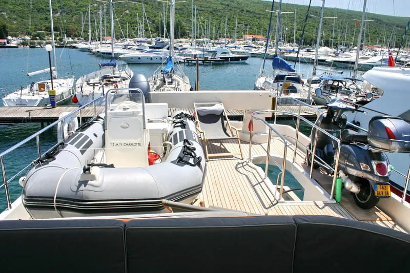  Yacht Photos Pics Deck of Selene 66 yacht with inflatable boat and scooter, docked at marina, 2026 model.