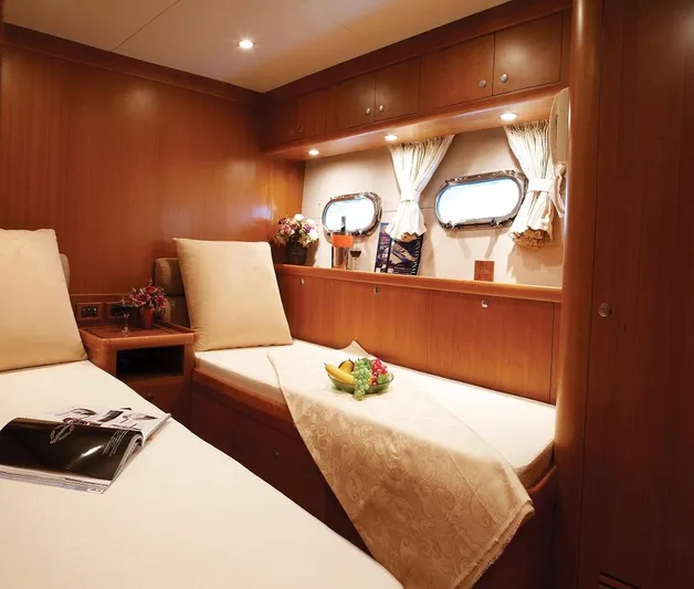  Yacht Photos Pics Luxurious cabin interior of 2026 Selene 66 yacht with elegant wood finish.