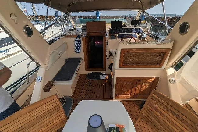  Yacht Photos Pics 2001 Apreamare Smeraldo 9 boat interior with wooden deck and seating area.