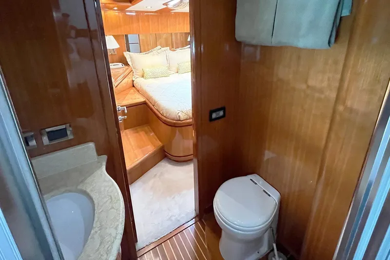 Angelina Yacht Photos Pics Luxurious Monte Fino 73 yacht interior with bathroom and cozy bedroom, 2005 model.