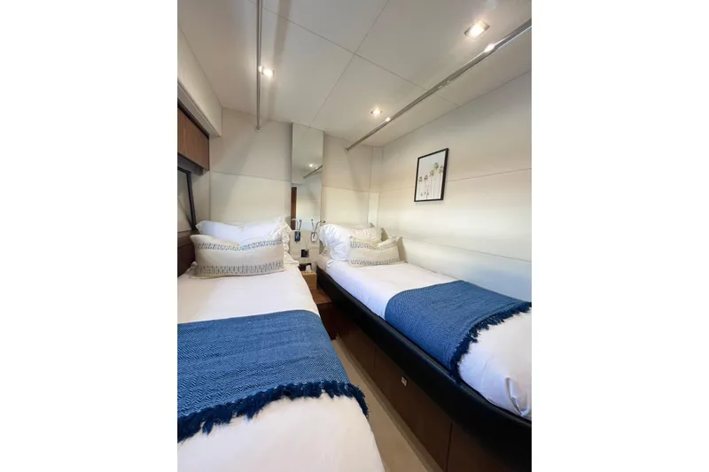 Ohana Yacht Photos Pics Luxurious twin cabin interior on 2012 Sunseeker Manhattan 73 yacht.