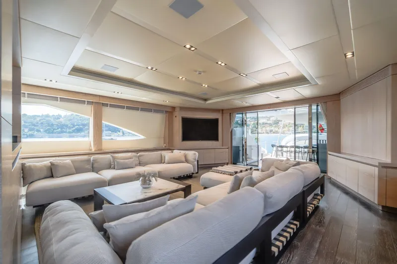 Fast & Furious Yacht Photos Pics Luxurious yacht interior with plush seating, large windows, and modern design, AB 145, 2016 model.
