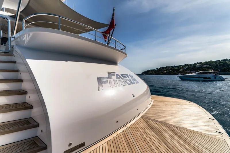 Fast & Furious Yacht Photos Pics Luxury yacht "Fast & Furious" on water, AB 145 model, 2016, with scenic coastal backdrop.