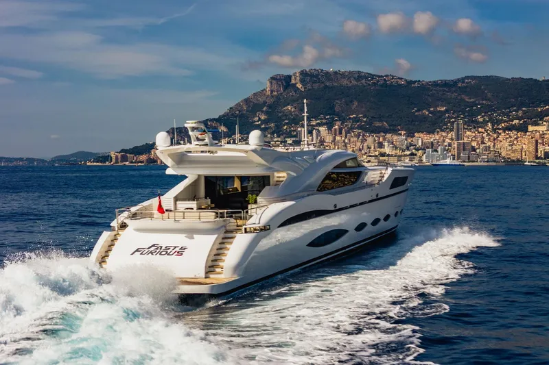 Fast & Furious Yacht Photos Pics Luxurious AB 145 yacht cruising near scenic coastline, 2016 model.