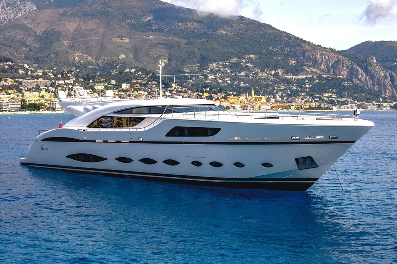 Fast & Furious Yacht Photos Pics Luxurious AB 145 yacht from 2016 cruising near scenic coastal town.