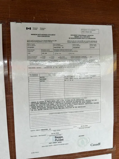 Eloquent Yacht Photos Pics Document on a wooden surface for a 1990 Palmer Marine 70 Pilothouse.