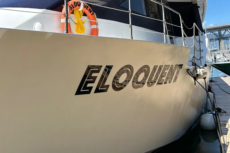 Eloquent Yacht Photos Pics Palmer Marine 70 Pilothouse 1990 yacht named "Eloquent" docked at marina.