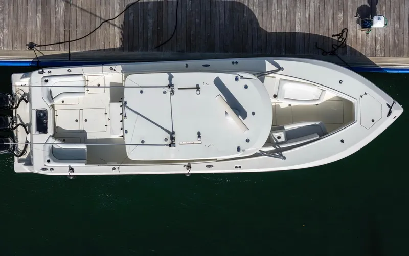 Liquid Asset Yacht Photos Pics Top view of 2012 SeaVee 39 LE boat docked on water.