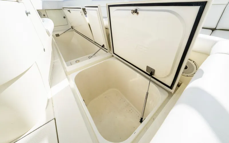 Liquid Asset Yacht Photos Pics Open storage compartments on 2012 SeaVee 39 LE boat deck.