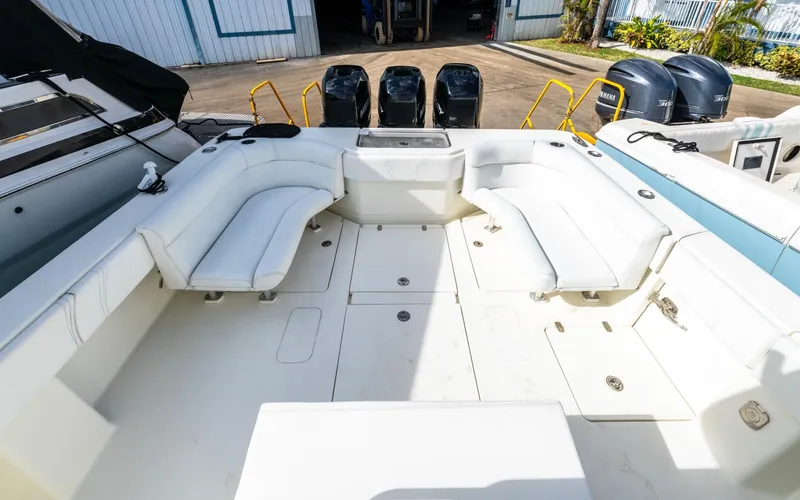 Liquid Asset Yacht Photos Pics 2012 SeaVee 39 LE boat with spacious seating and multiple outboard engines.