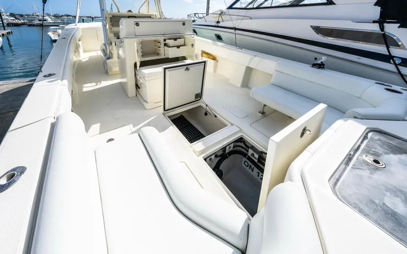 Liquid Asset Yacht Photos Pics 2012 SeaVee 39 LE boat interior with open storage compartments at marina.