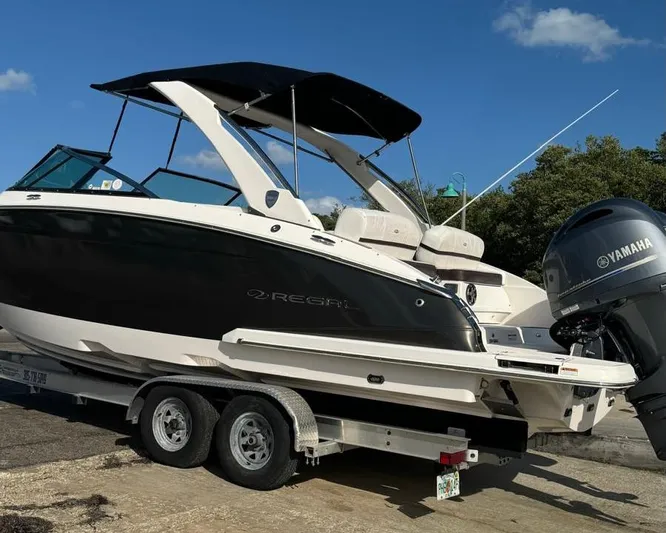  Yacht Photos Pics 2017 Regal 29 OBX boat on trailer with Yamaha outboard motor, parked outdoors.