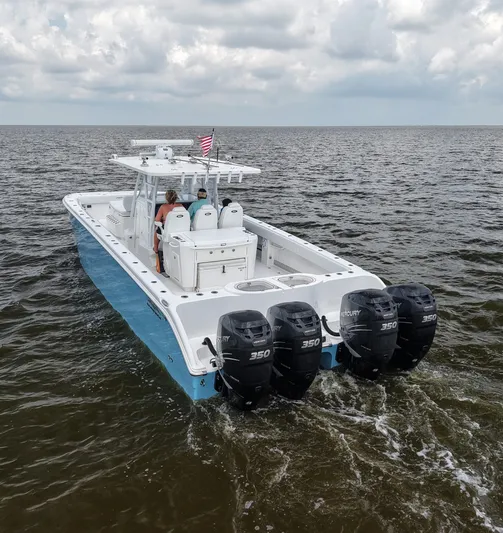  Yacht Photos Pics 2018 Invincible 40 Catamaran with quad Mercury 350 engines cruising on open water.