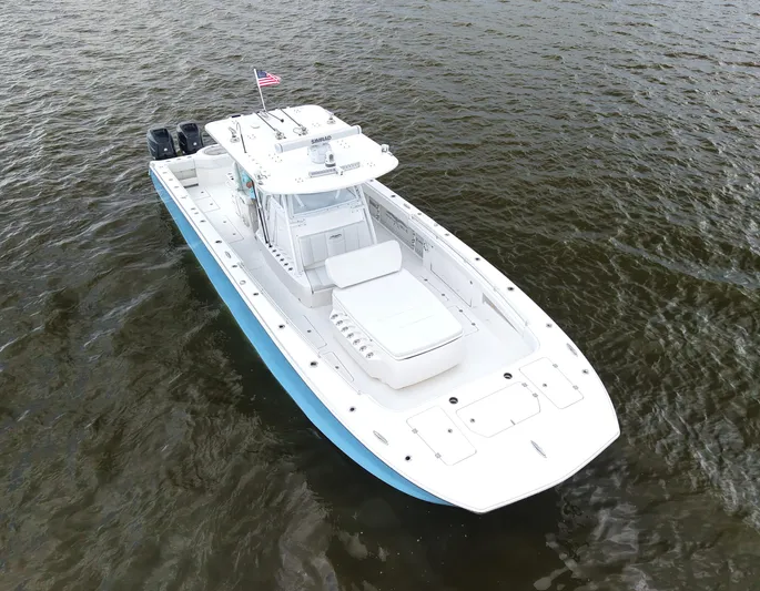  Yacht Photos Pics 2018 Invincible 40 Catamaran on water, aerial view, white and blue design.