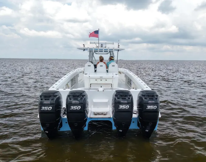  Yacht Photos Pics 2018 Invincible 40 Catamaran with quad 350 engines on open water.