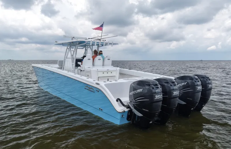  Yacht Photos Pics 2018 Invincible 40 Catamaran with four Mercury 350 engines on open water.