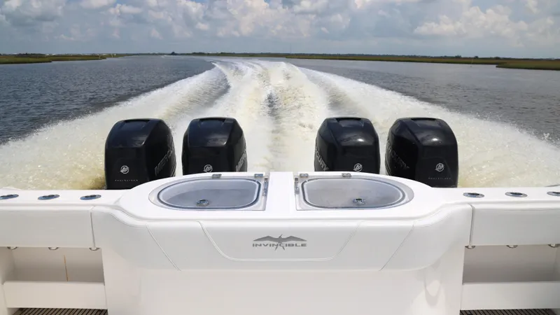  Yacht Photos Pics Invincible 40 Catamaran 2018 cruising with four powerful engines on open water.