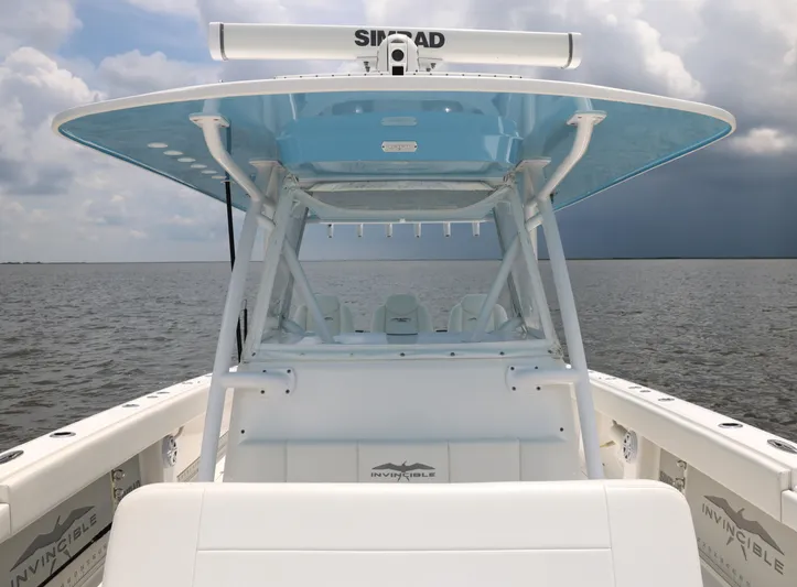  Yacht Photos Pics 2018 Invincible 40 Catamaran on open water, featuring a sleek design and spacious deck.