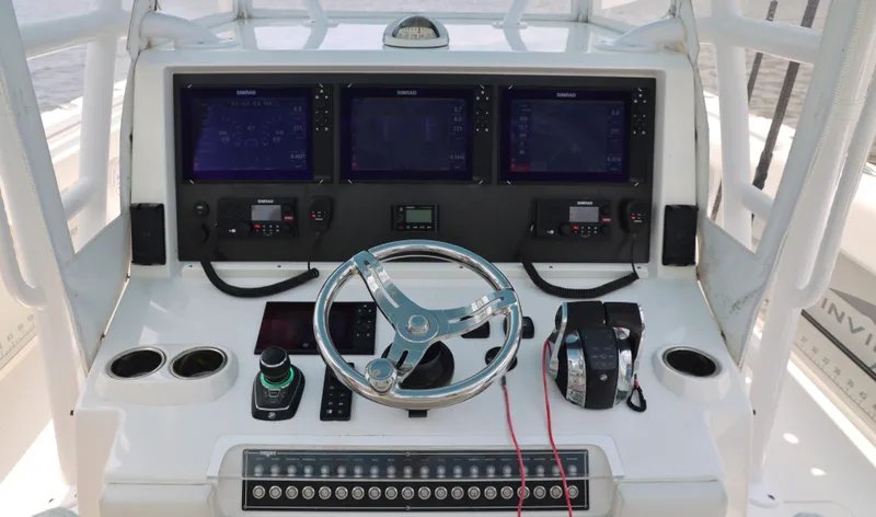  Yacht Photos Pics Cockpit of 2018 Invincible 40 Catamaran with advanced navigation and control systems.