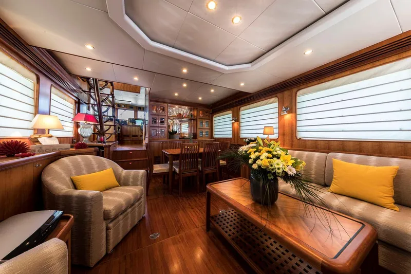 Yacht Photos Pics Luxurious interior of 2026 Selene 62 yacht with elegant seating and floral arrangement.