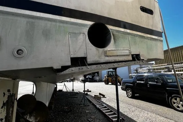 Moses Yacht Photos Pics 2003 Lyman-Morse Wesmac Sportfish Cruiser in dry dock, showing hull and propeller area.
