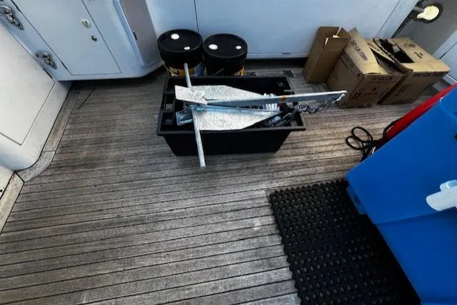 Moses Yacht Photos Pics 2003 Lyman-Morse Wesmac Sportfish Cruiser deck with equipment and storage boxes.