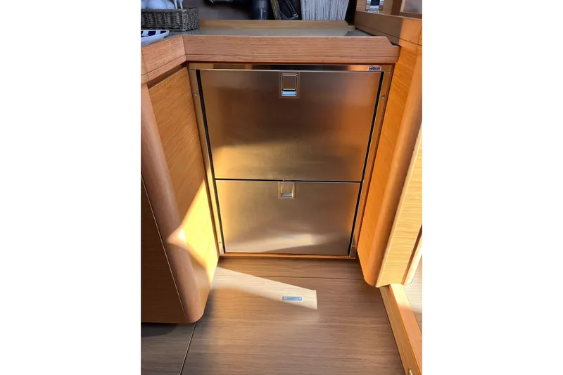 Cum Laude Yacht Photos Pics Stainless steel cabinet in 2017 Dufour 512 Grand Large yacht interior.