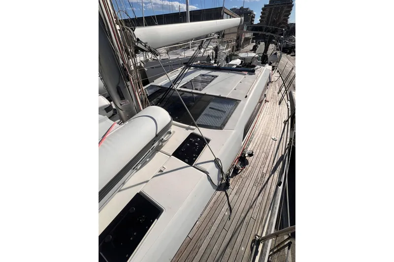 Cum Laude Yacht Photos Pics 2017 Dufour 512 Grand Large sailboat docked, showcasing sleek deck design and modern features.