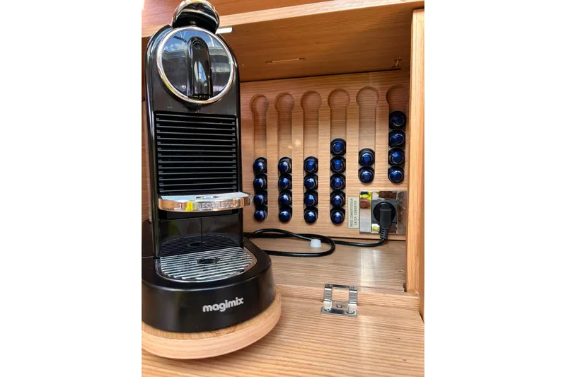 Cum Laude Yacht Photos Pics Coffee machine with capsule storage on a 2017 Dufour 512 Grand Large yacht.