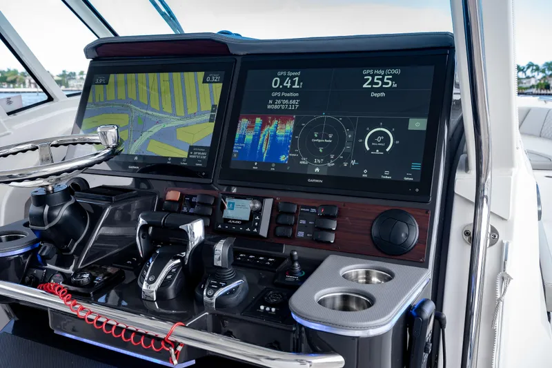  Yacht Photos Pics Dashboard of 2022 Pursuit S 428 Sport boat with advanced navigation displays.