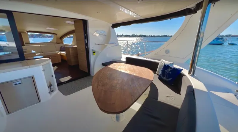 Fido Yacht Photos Pics Luxurious 2017 Xquisite Yachts X5 interior with elegant seating and ocean view.