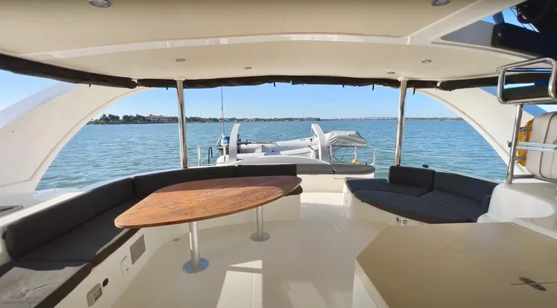 Fido Yacht Photos Pics Luxurious 2017 Xquisite Yachts X5 interior with ocean view and elegant seating area.