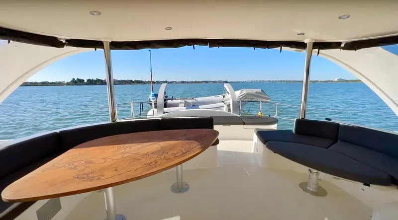 Fido Yacht Photos Pics Luxurious 2017 Xquisite Yachts X5 catamaran interior with ocean view and elegant seating area.