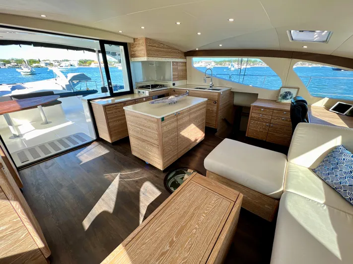 Fido Yacht Photos Pics Luxurious 2017 Xquisite Yachts X5 interior with modern kitchen and scenic ocean views.