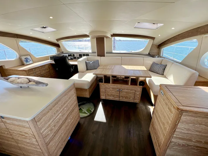 Fido Yacht Photos Pics Luxurious 2017 Xquisite Yachts X5 interior with elegant wood finish and panoramic windows.