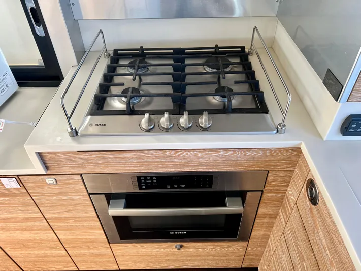 Fido Yacht Photos Pics Modern kitchen with Bosch stove and oven on 2017 Xquisite Yachts X5.