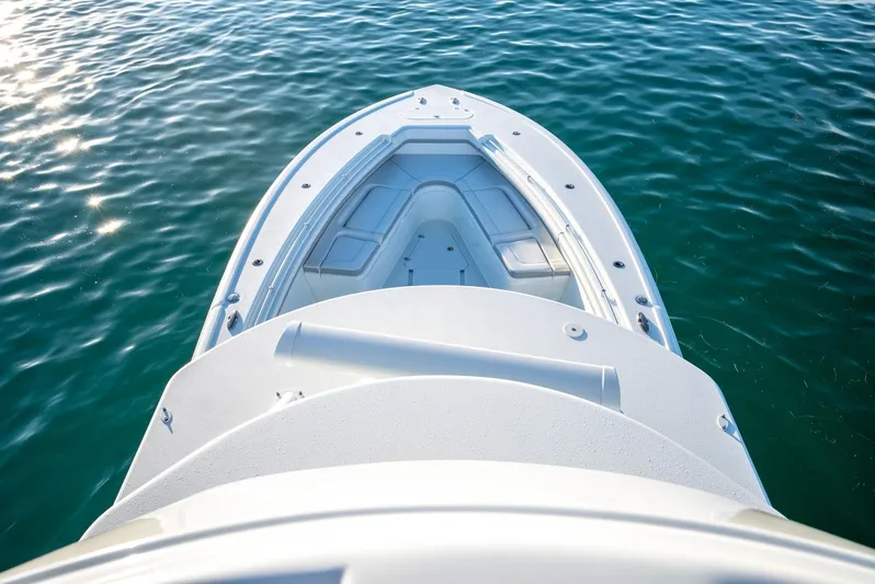  Yacht Photos Pics Yellowfin 42 boat bow on clear water, 2021 model.