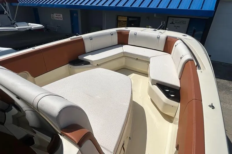  Yacht Photos Pics 2024 Capoforte FX270 boat interior with spacious seating and modern design.