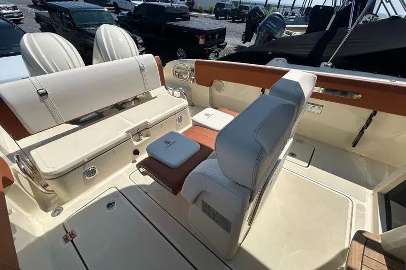  Yacht Photos Pics 2024 Capoforte FX270 boat interior with luxurious seating and modern design.