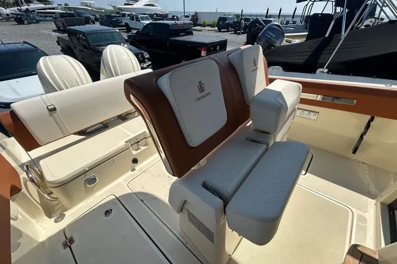  Yacht Photos Pics 2024 Capoforte FX270 boat interior with luxurious seating and elegant design.