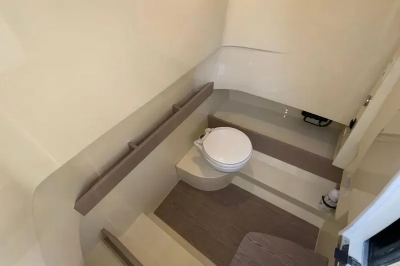  Yacht Photos Pics 2024 Capoforte FX270 boat interior bathroom with modern design and compact toilet.