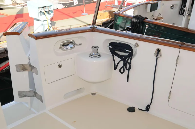  Yacht Photos Pics Sleek Selene 54 yacht deck, featuring polished wood and nautical equipment, 2026 model.