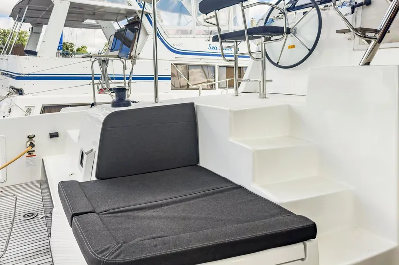 Sweet Sweet Life Yacht Photos Pics Cockpit seating and helm of 2020 Lagoon 42 catamaran, featuring modern design and comfort.