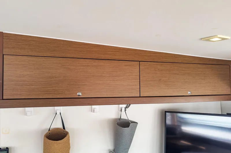 Sweet Sweet Life Yacht Photos Pics Wooden cabinet interior of 2020 Lagoon 42 yacht with modern design elements.