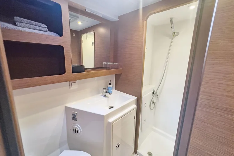 Sweet Sweet Life Yacht Photos Pics Modern bathroom in 2020 Lagoon 42 yacht with shower and sink.