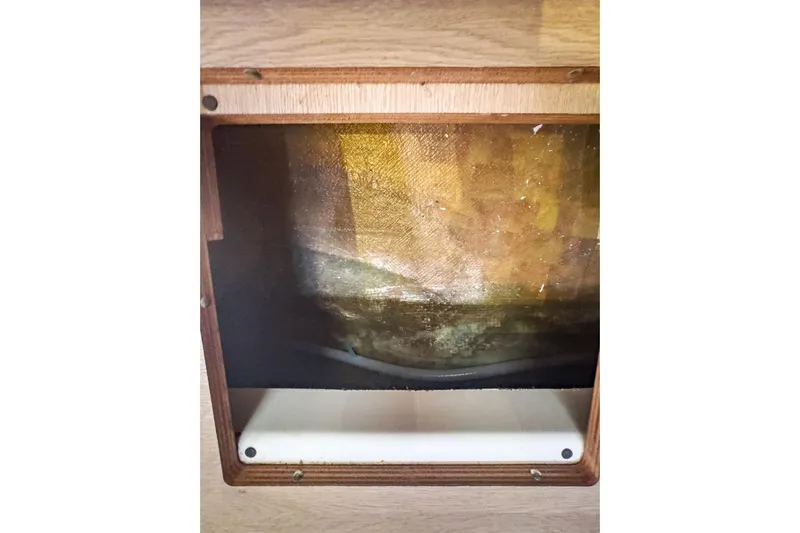 Sweet Sweet Life Yacht Photos Pics Interior view of a 2020 Lagoon 42 yacht, showcasing a wooden panel detail.