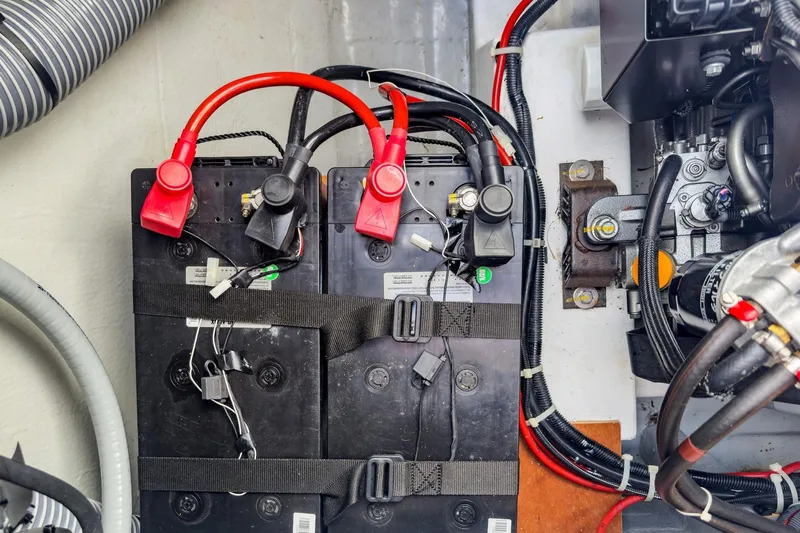 Sweet Sweet Life Yacht Photos Pics Battery compartment of a 2020 Lagoon 42 catamaran with cables and connectors.