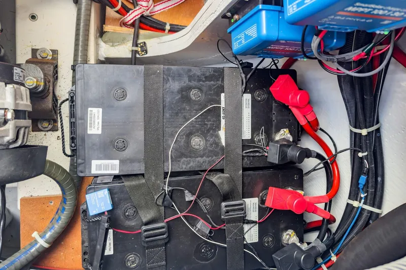 Sweet Sweet Life Yacht Photos Pics Battery compartment of a 2020 Lagoon 42 yacht, featuring wiring and connectors.